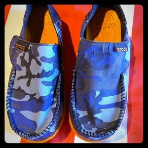 Boys Crocs slip ons.